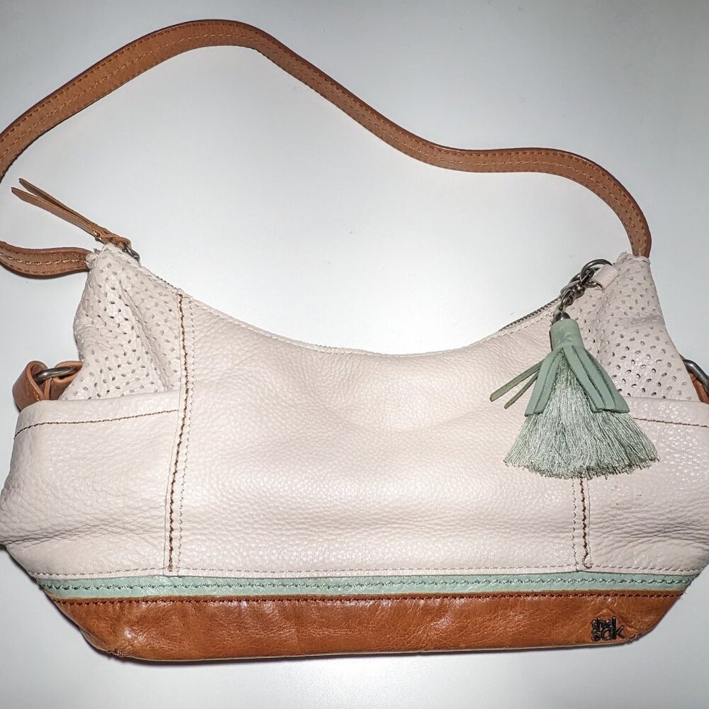 The Sak New Zealand white perforated leather hobo purse w/aqua accents
